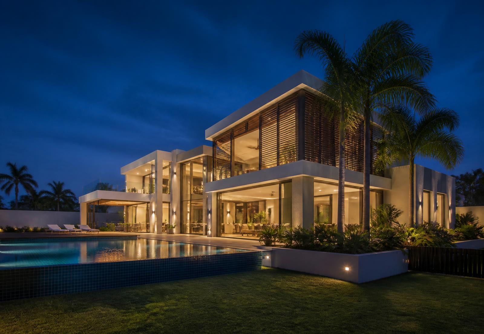 Modern residence in Accra lit at dusk